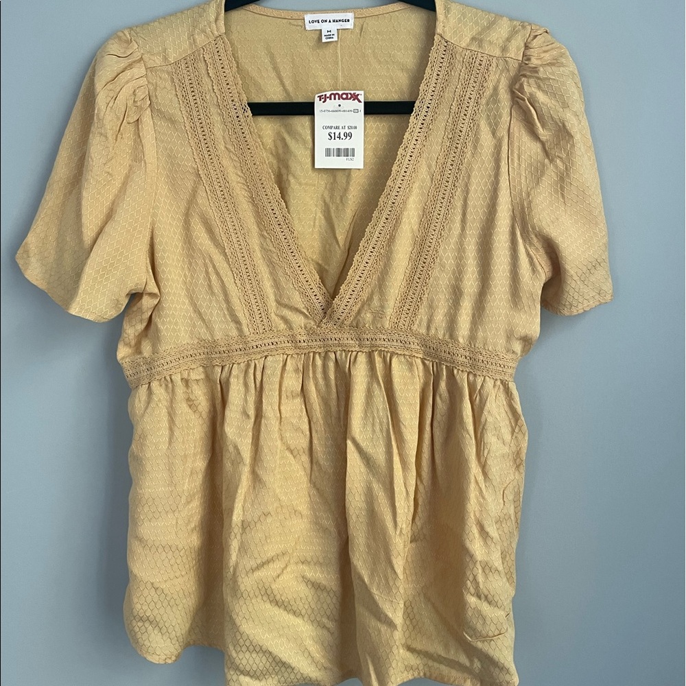 Ladies mustard color v-neck empire waist top. -NWT